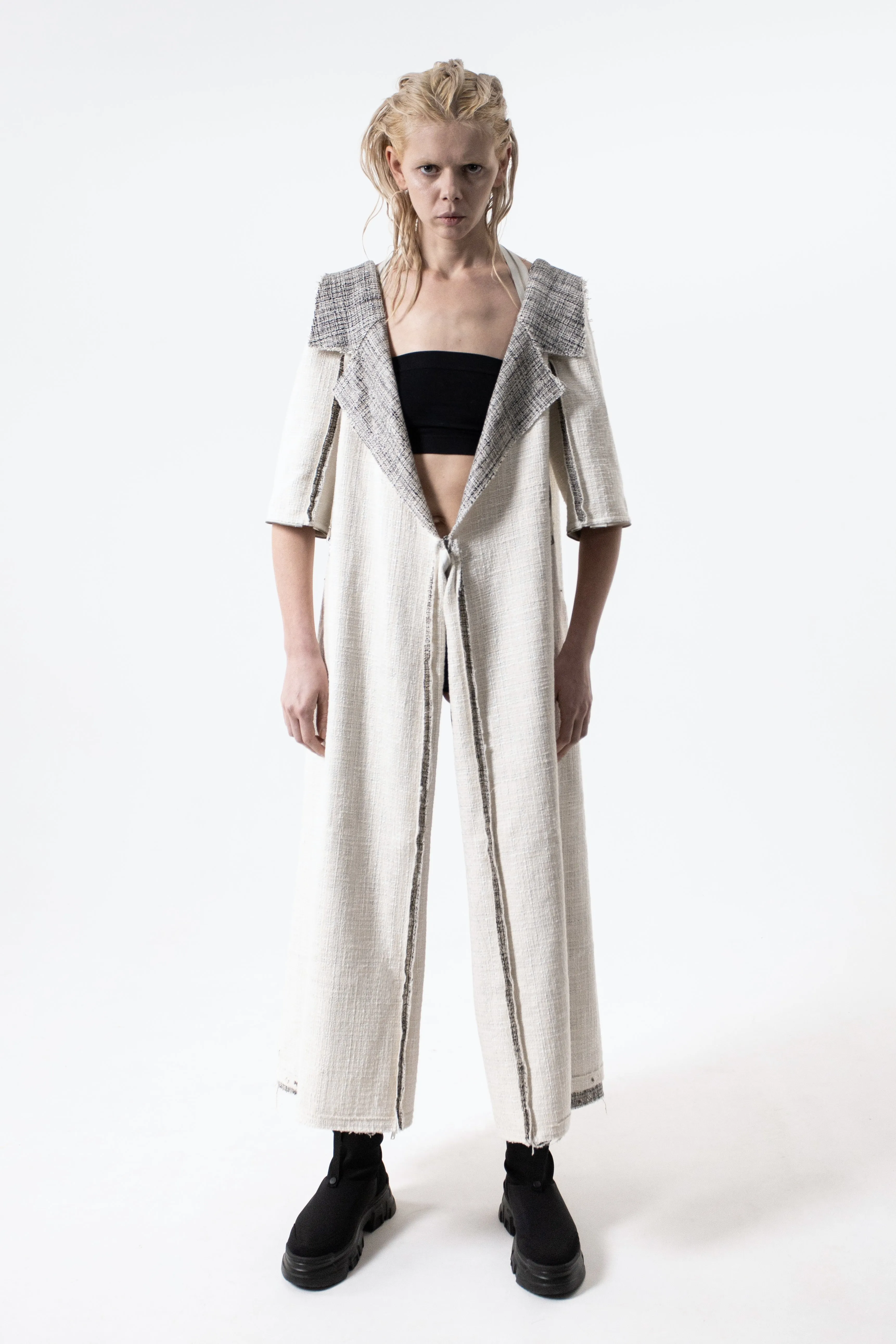 DUALITY 10 -way transforming piece: coat / jumpsuit / vest / dress / 4 bags