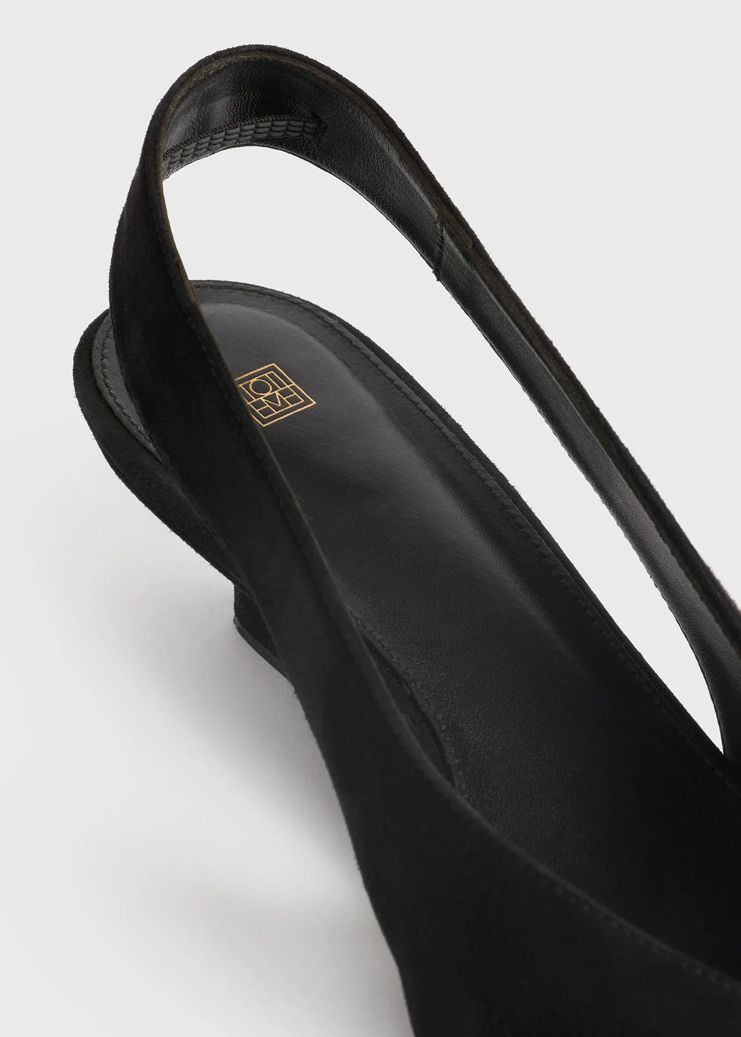 The Suede Wedge-Heel Slingback black